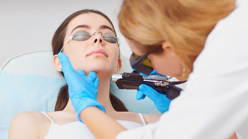 Docter Performing Laser Treatment